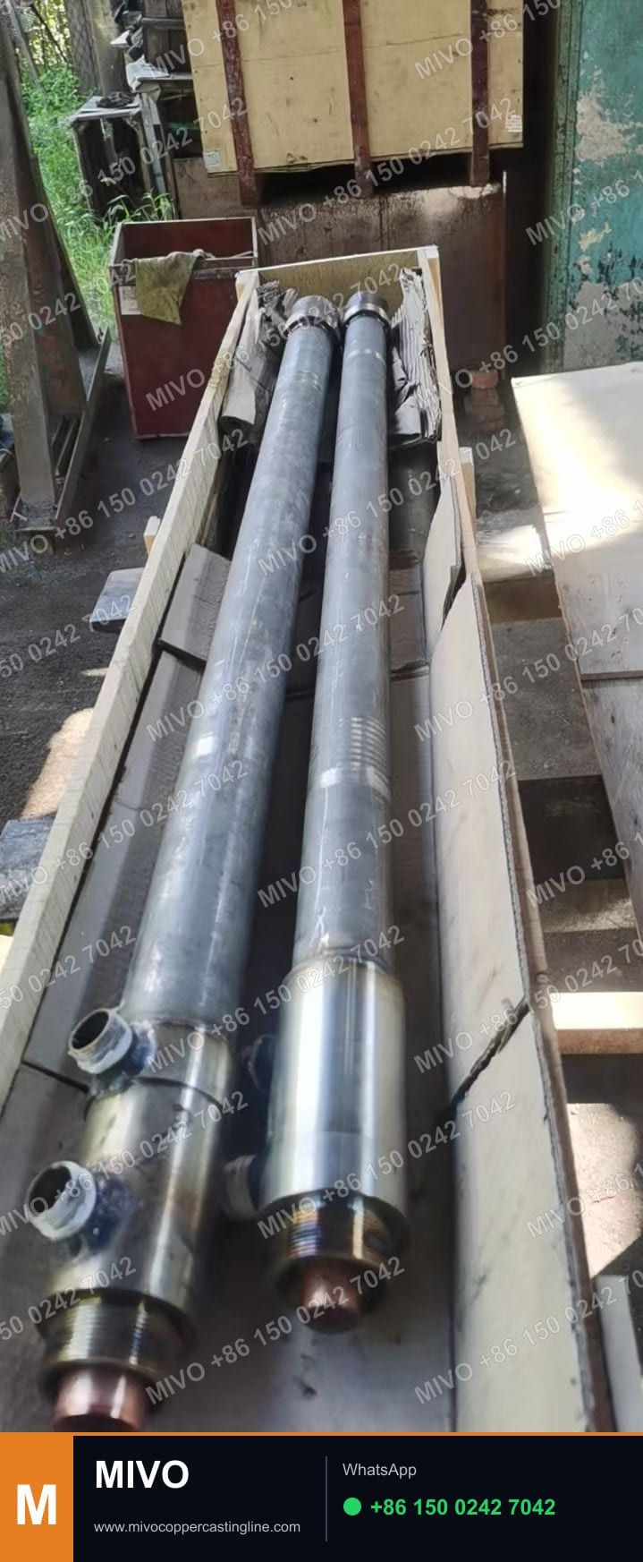 Water-cooled copper rod upcast crystallizer with copper head